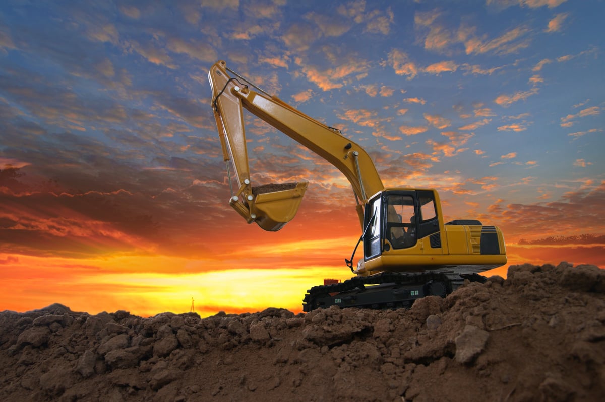 Excavators shaping the land